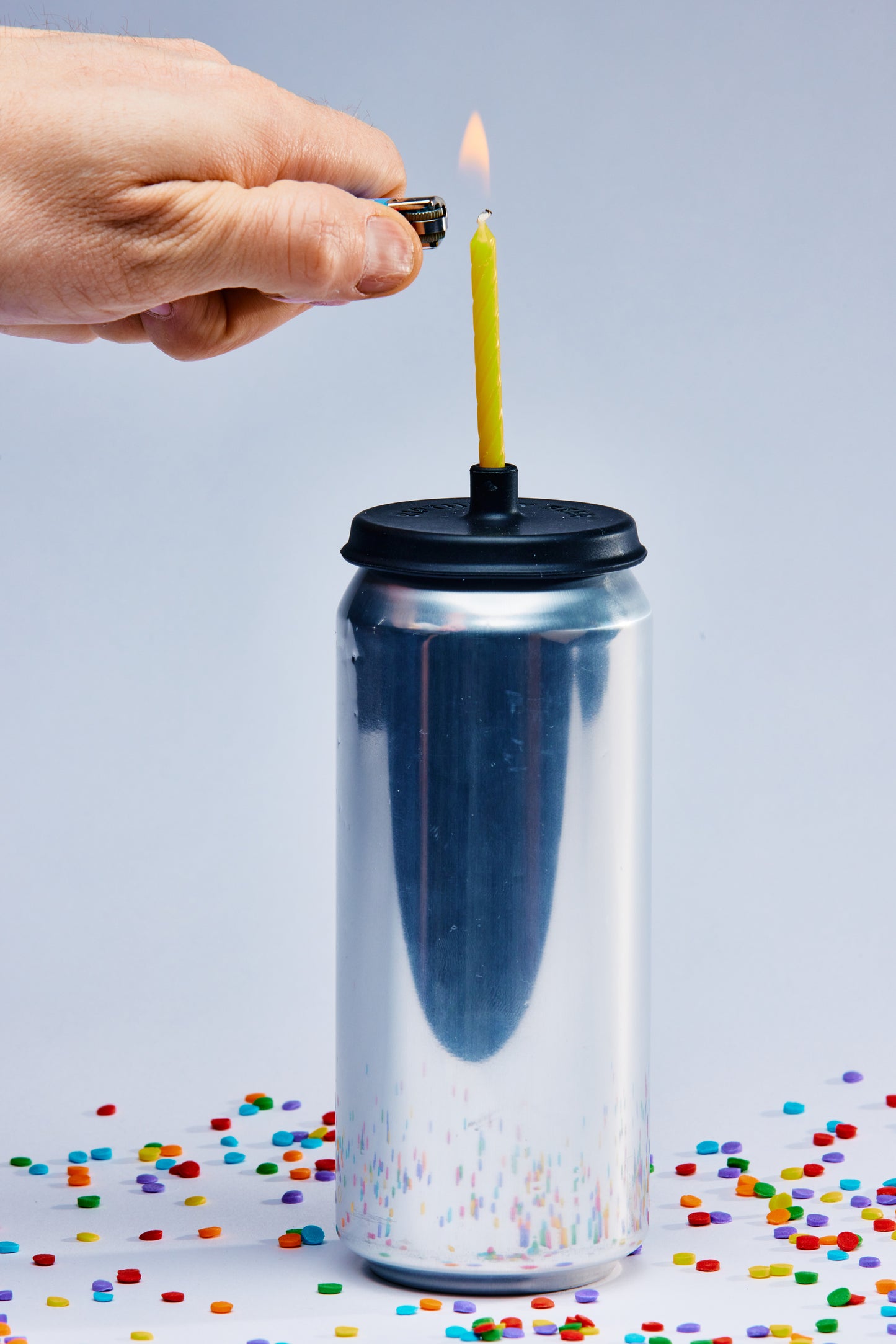 Lit Lids silicone candle holder on a beer can