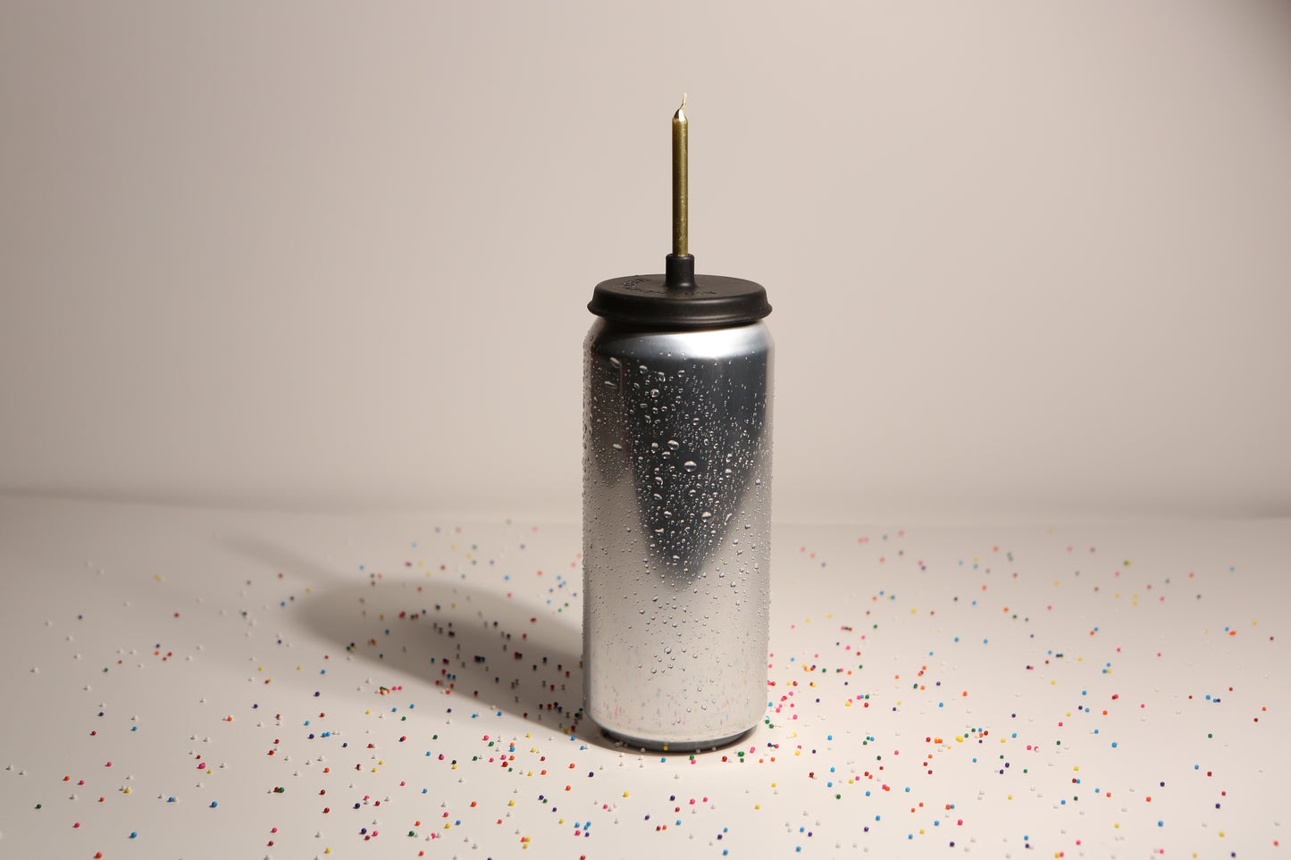 Lit Lids silicone candle holder on a beer can