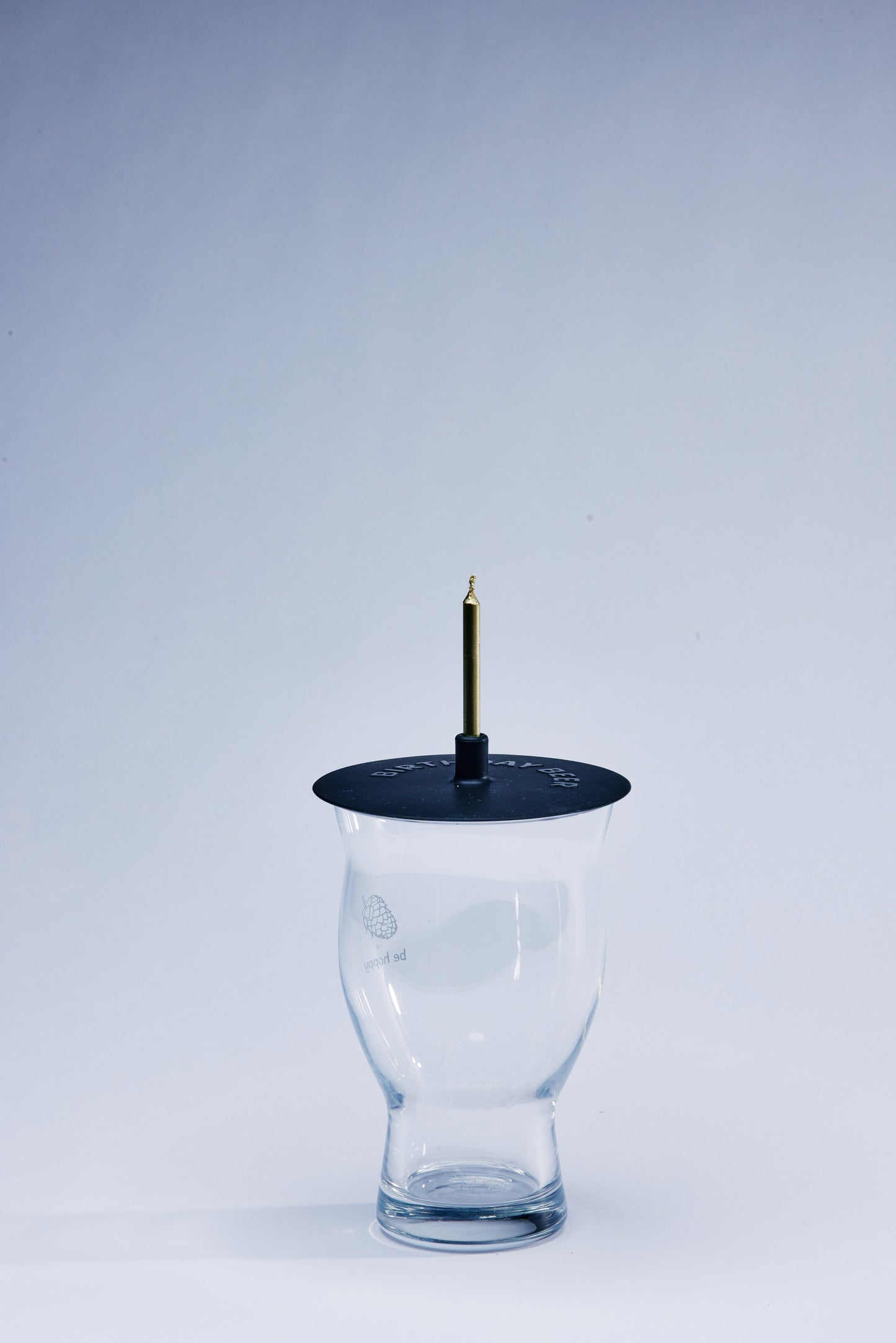 Birthday Beer Lit Lids silicone candle holder on a beer glass