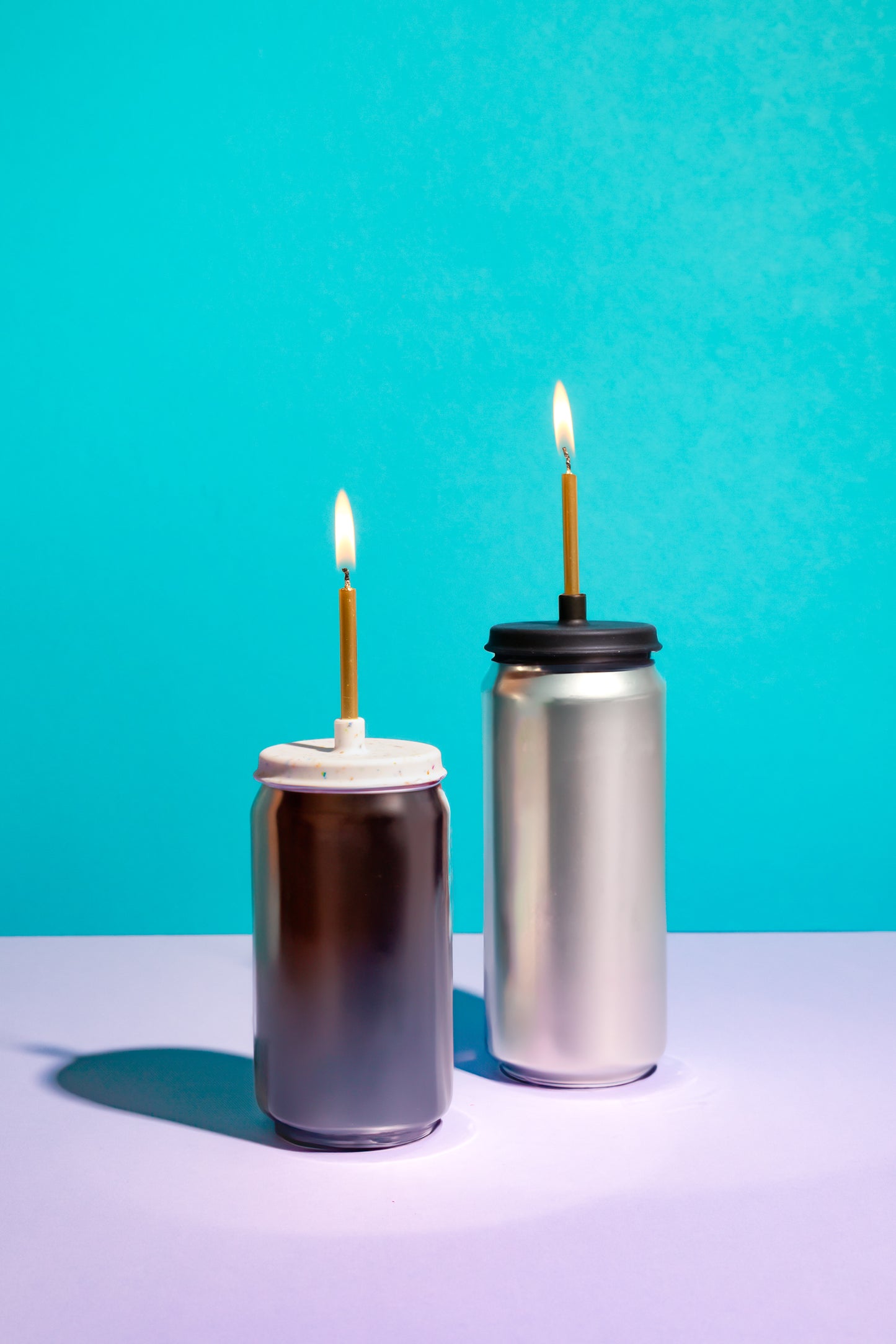 Two Lit Lid Beer Candles Get Lit With Flame