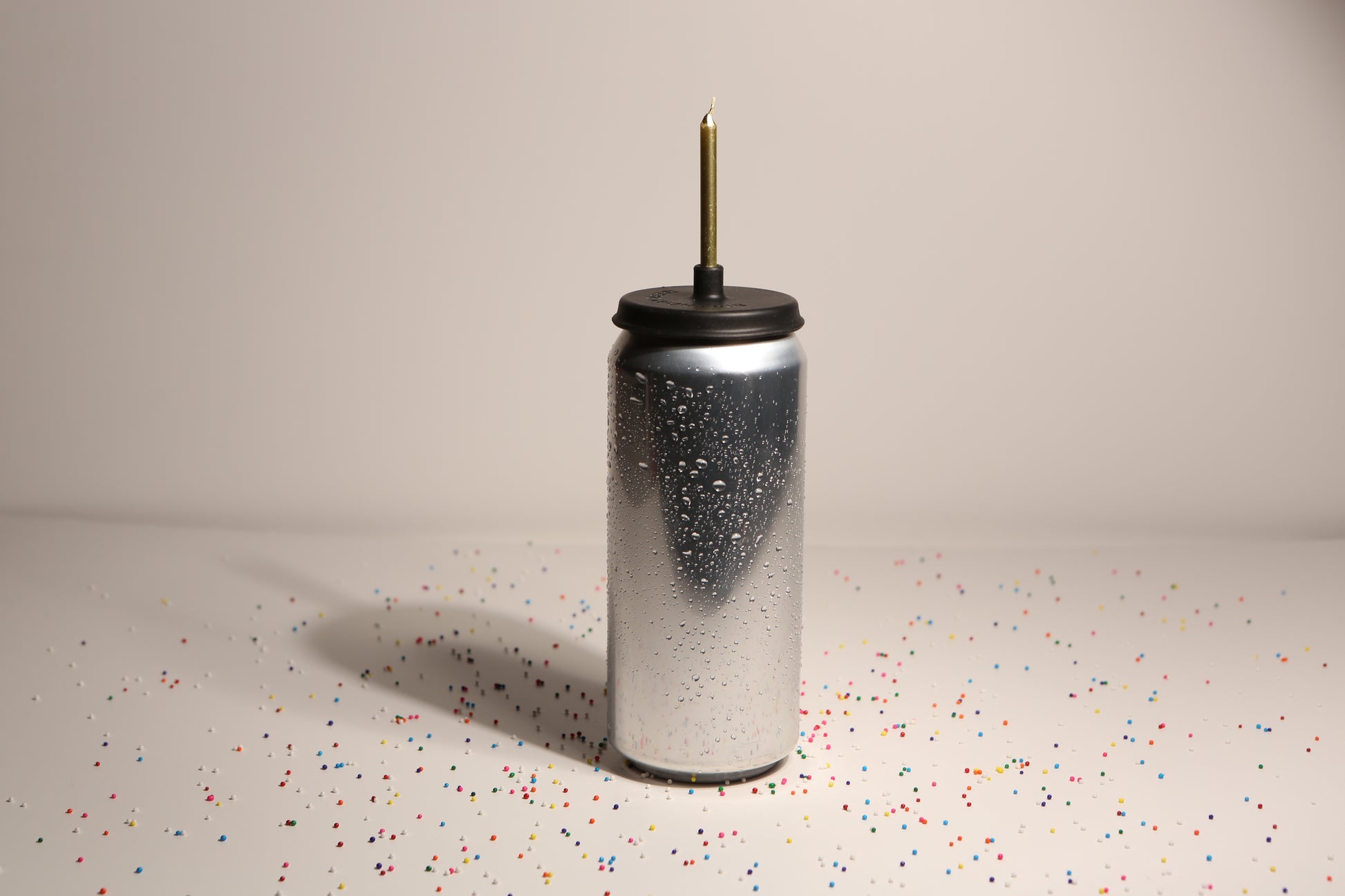 Lit Lids silicone candle holder on a beer can