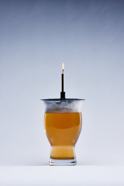Lit Lids silicone candle holder on a birthday beer glass