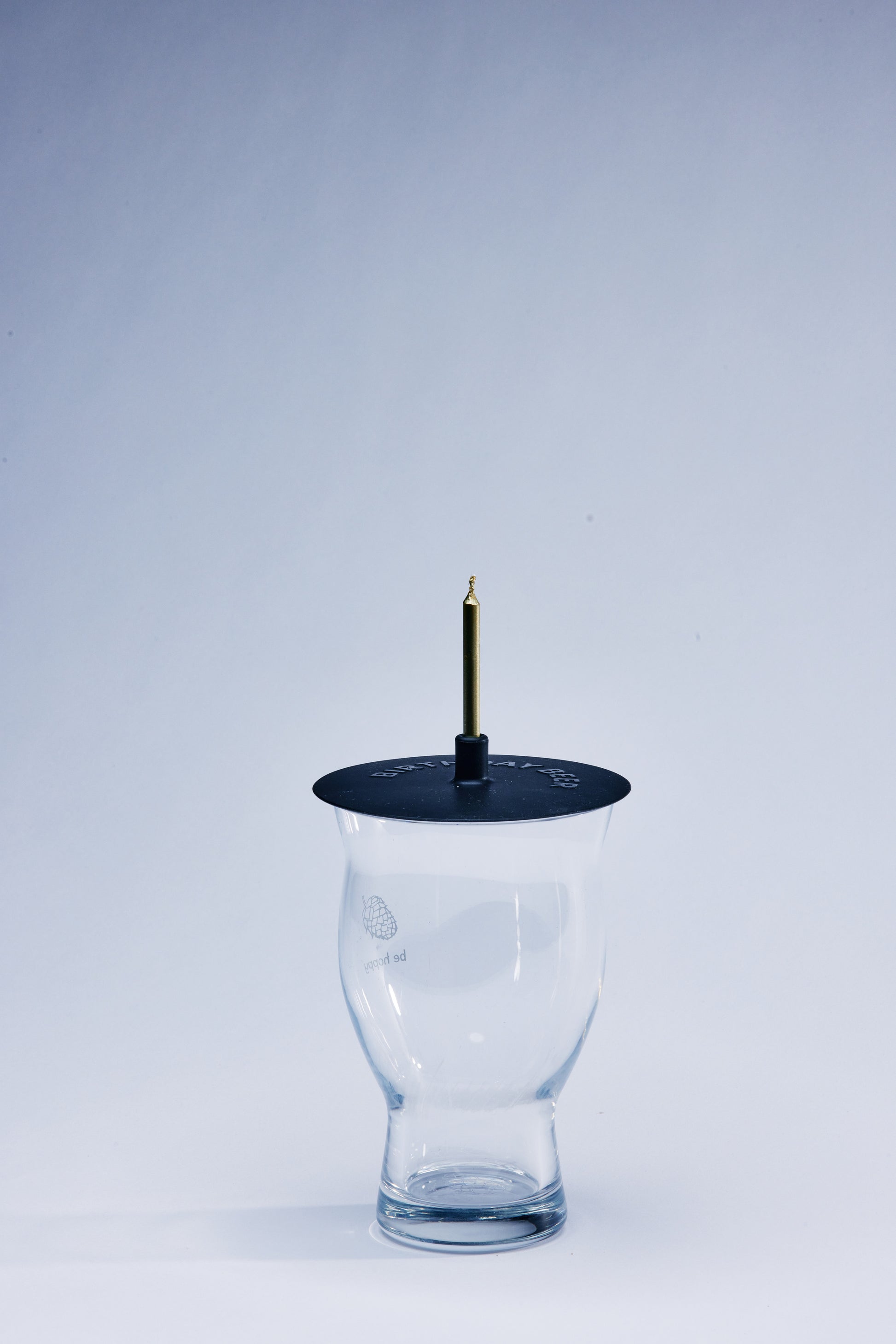 Birthday Beer Lit Lids silicone candle holder on a beer glass